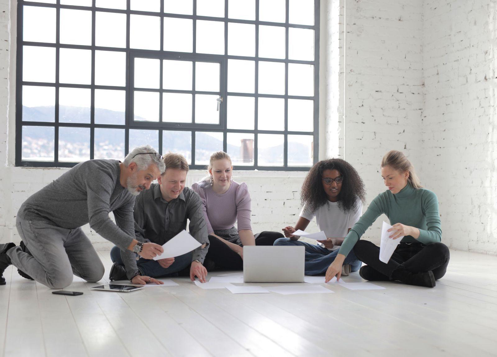 A small team working together on the office floor
