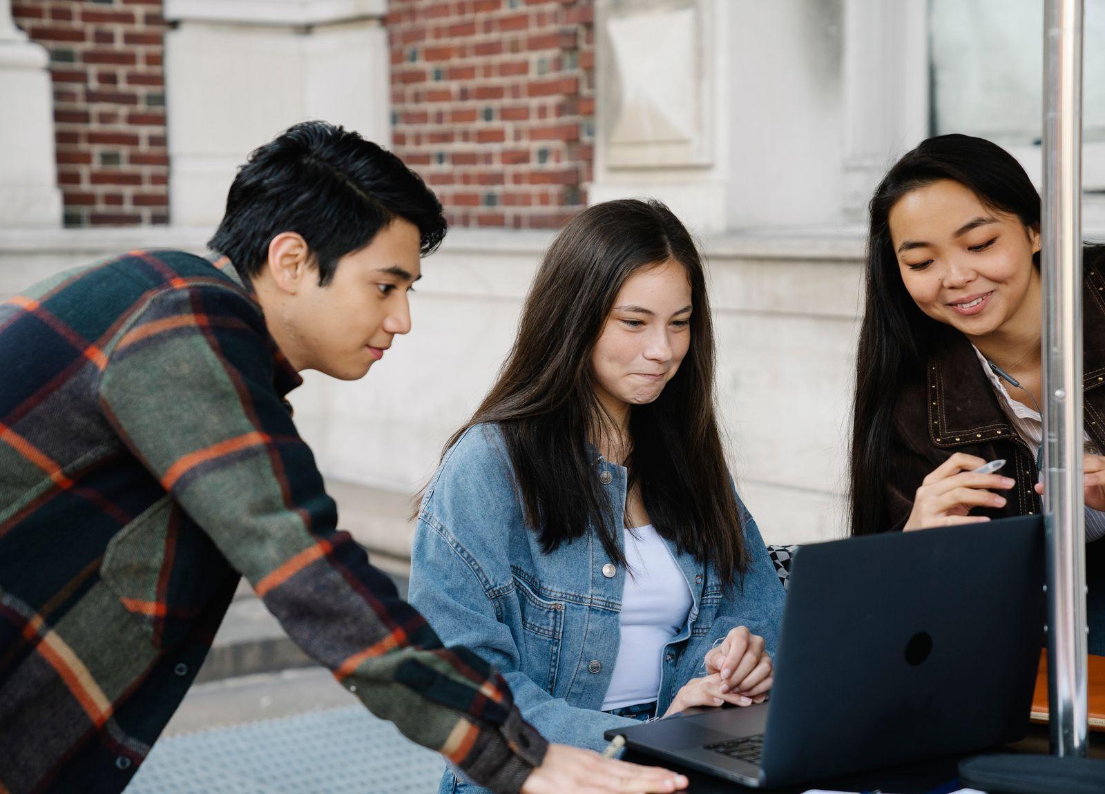 Students working together on a laptop