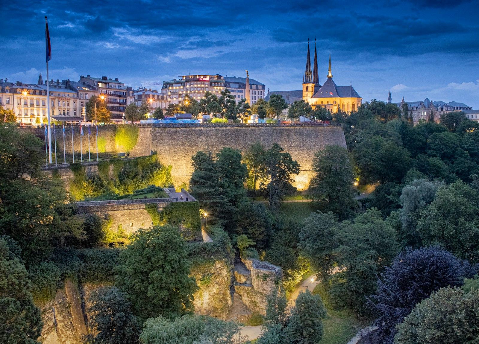 The Pétrusse park and Notre-Dame Cathedral in Luxembourg City at night