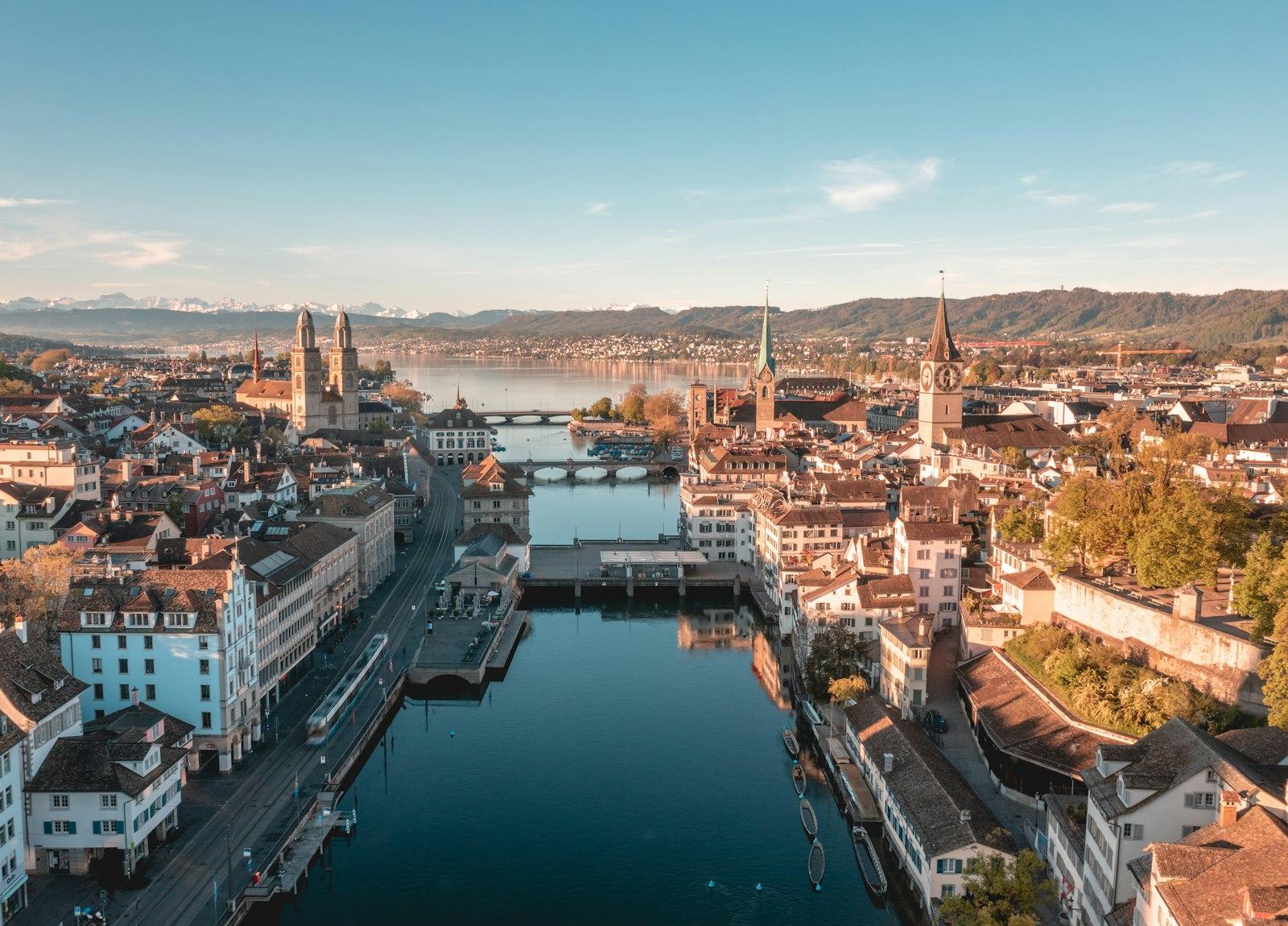 Zurich's old town on the Limmat, with the lake and the Alps behind
